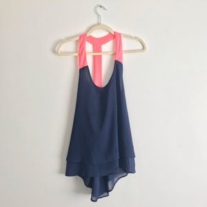Navy blouse with neon coral accent